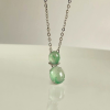 07 Icy Light Green Floating Flower Jadeite Pendant 1 Icy Light Green Floating Flower Jadeite Pendant