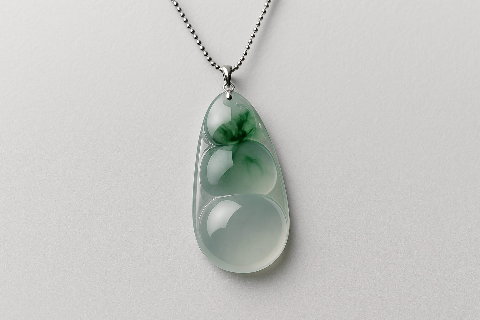 Jade-Pendant-Elegance-grey.webp Icy Flower Gold - Inlaid Lucky Bean Pendant